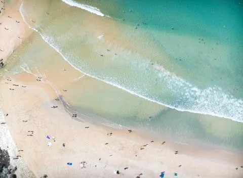 Top view beach with waves crashing on sandy shore,Beautiful waves sea surfa.. Stock Photos
