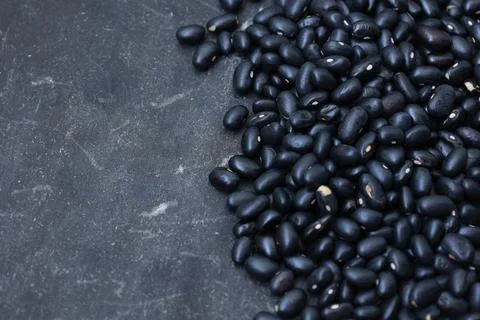 Top view of a bean on black background Фото