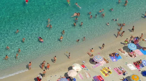  top view of a beautiful beach with sunbathers on a hot day in August-Tropea, It Stock Footage 68335010