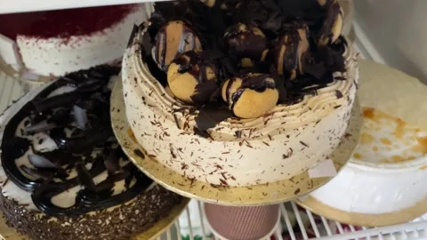 Top View of Beautiful Cakes in a Deep Freezer Stock Footage 286856353