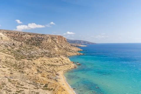 Top view of beautiful cliffs with blue sea. Summer background. Stock Photos