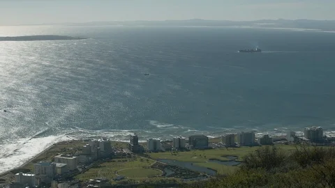 Top view of the beautiful district of Cape Town located along the ocean coast Stock Footage 120467981