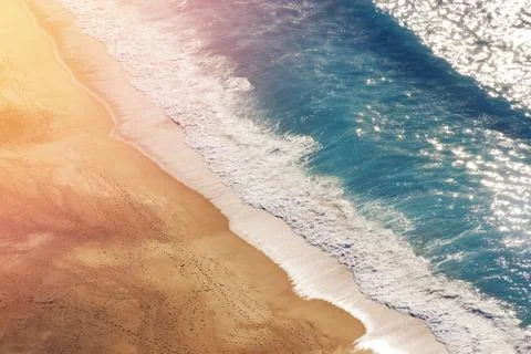 Top view of beautiful empty sand beach with waves Stock Photos