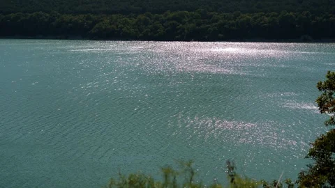 Top view of a beautiful lake among the mountains in summer. Stock Footage 287589153