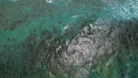 Top view of beautiful sand beach with azure seawater, wave passes, aerial shot Stock Footage 260196369