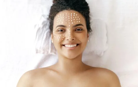 Top view of a beautiful smiling hispanic or brazilian woman, with naked 스톡 사진