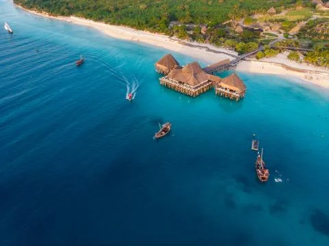 Top View on Beautiful thatch stilt house restaurant at Zanzibar Kendwa beach at Stock Photos