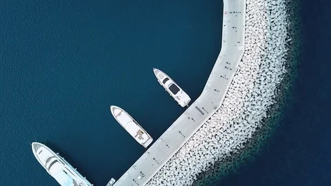 Top view on beautiful white dock with yachts on blue water background, Limassol Video stock 121262588