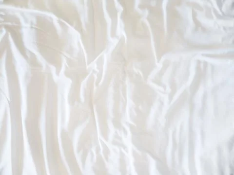 Top view of bedding sheets crease, White Wrinkled Fabric Texture for backgrou Stock Photos
