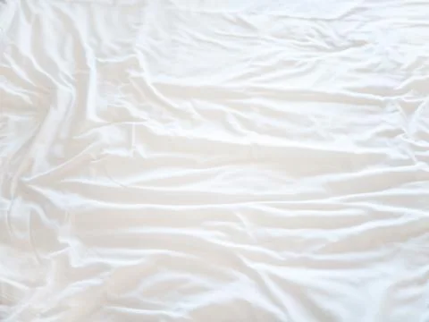 Top view of bedding sheets crease, White Wrinkled Fabric Texture for backgrou Stock Photos