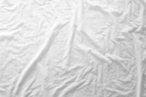 Top view of bedding sheets or white fabric wrinkle texture background Stock Photos