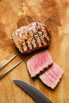 Top view of beef steak medium rare with slices Stock Photos