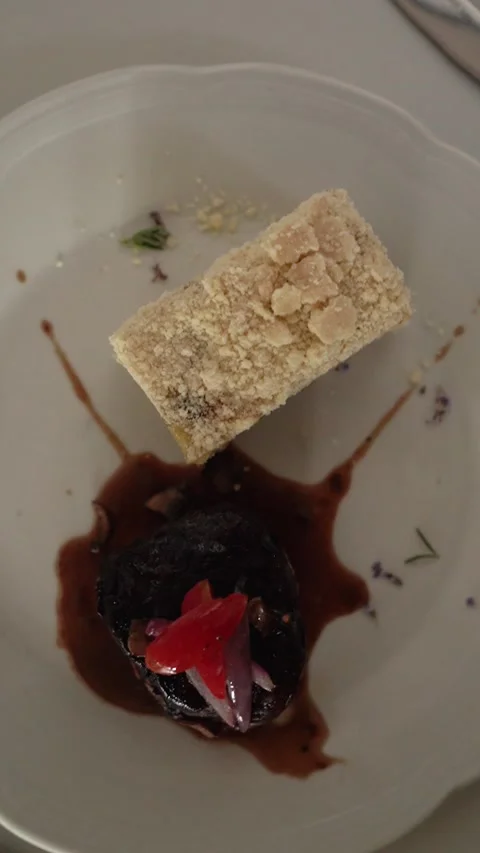 Top view of Beef Tournedos with Potato Millefeuille in an elegant table Stock Footage 336272299