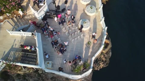 Top view of beginning of wedding ceremony on the cliff. Drone aerial view Video stock 201216182