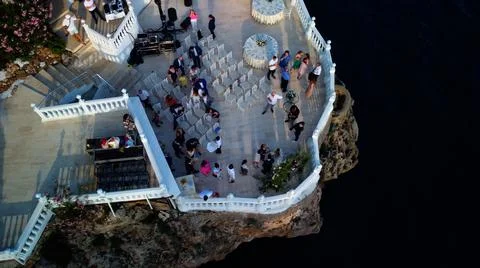 Top view of beginning of wedding ceremony on the cliff. Drone aerial view Stock Photos