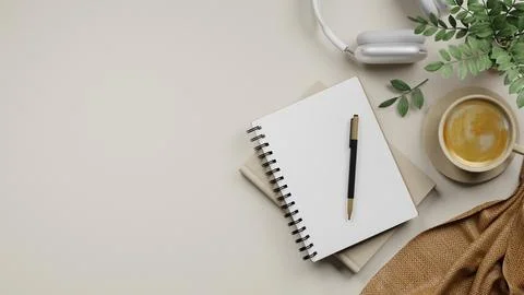 Top view of beige desk with blank notebook, pen, headphones, coffee cup wit.. Stock Illustration