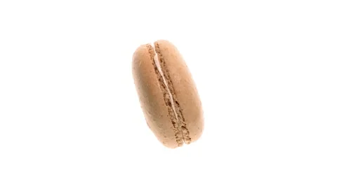 Top view of beige macaroon cookie rotating on side. Isolated on white Stock Footage 161056584