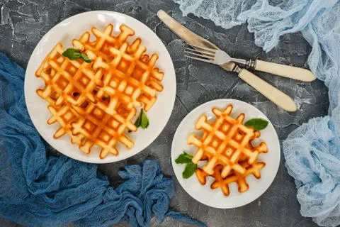 Top view of Belgian waffles on table. Stock Photos