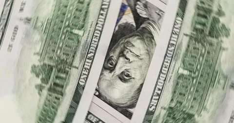 Top view to Benjamin Franklin portrait between two hundred dollar bills. Stock Footage 142659395