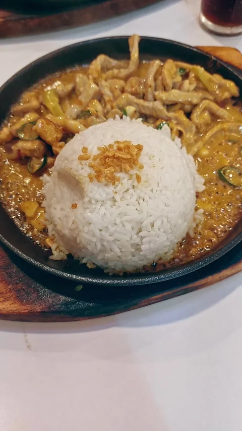 Top view of Bicol express served in a si... | Stock Video | Pond5