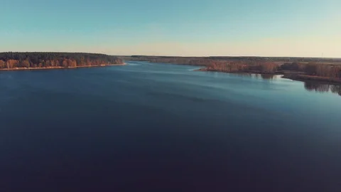 Top view of big river with forest upon the horizon 動画素材 93151586