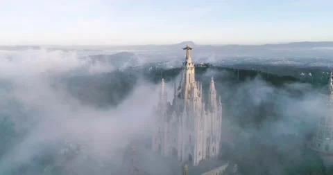 The top-view of the big statue of the Sacred Heart in the Temple of Tibidabo Stock Footage 184580522