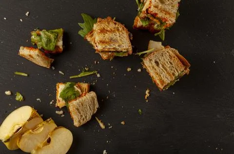Top view of Bite size cheese sandwich in toasted bread with toothpricks Stock Photos