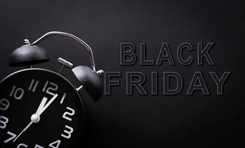 Top view of Black Friday background concept made from  alarm clock and the te Stock Photos