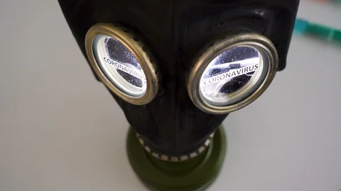 Top view of the black hazard mask with the coronavirus or Covid-19 Видео 129344677
