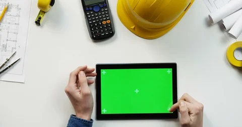 Top view on the black horizontal tablet device on the white table of the Stock-Footage 96184269