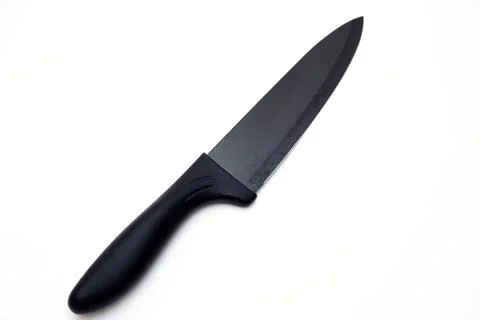 Top view of a black matte sharp knife isolated in white 写真素材