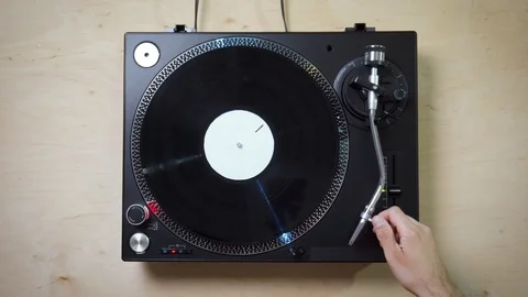 Top view on black modern turntable with rotating LP record Stock Footage 113013098