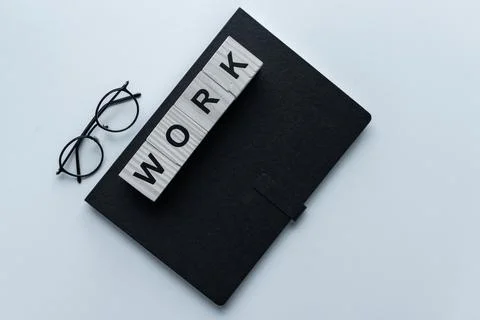 Top view black notebook cubes Foto stock