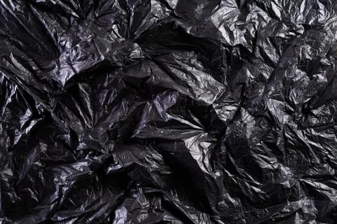 Top view of Black plastic bag texture and background. Reduction of plastic ba Stock Photos