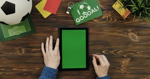 Top view on the black tablet device with chroma key screen being vertically on Stock Footage 96320165