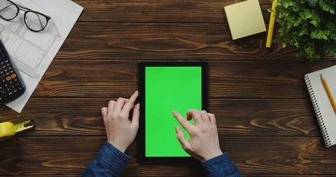 Top view on the black vertical tablet computer on the wooden table of architect Video stock 96180998