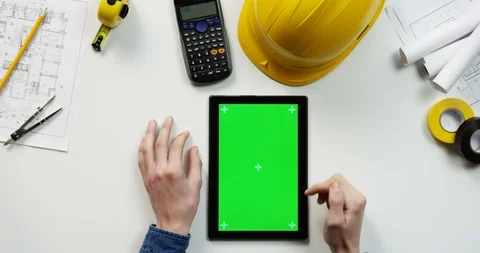 Top view on the black vertical tablet device on the white table of the building Stock Footage 96184209