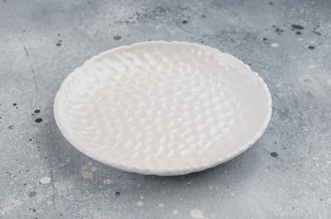Top view blank ceramic plate with patterned surface, modern minimalist tabl.. Stock Photos