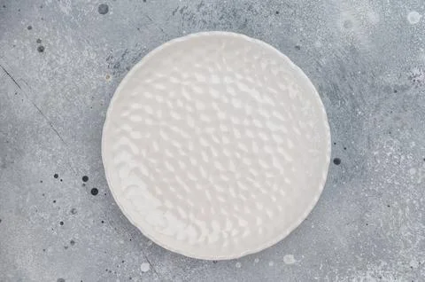 Top view blank ceramic plate with patterned surface, modern minimalist tabl.. Stock Photos