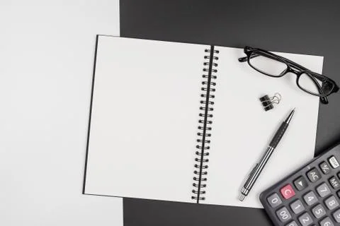Top view of  blank notebook and pencil on black and white background Foto stock