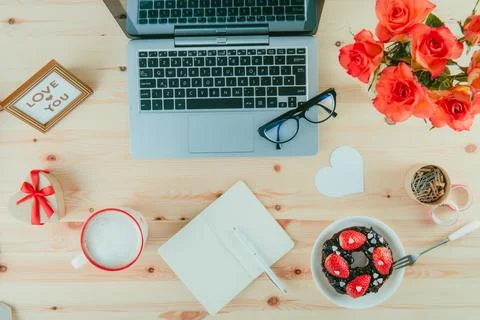 Top view blank notebook, fresh coffee and festive sweet breakfast surprise with Stock Photos