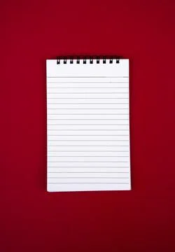 Top View of Blank Notebook Isolated on Red Background for Notes Stock-Fotos
