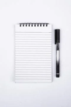 Top View of Blank Notebook with Pen on White Background for Writing Ideas Stock Photos
