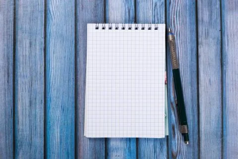 Top view of blank open notebook paper on background, office equipment, school Stock Photos