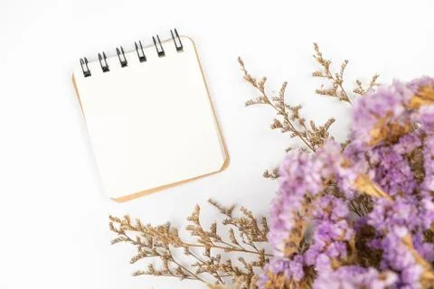Top view of a blank paper note with flower bouquet Stock Photos
