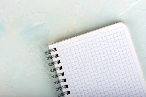 Top view of a blank sheet of squared notebook. Stock Photos