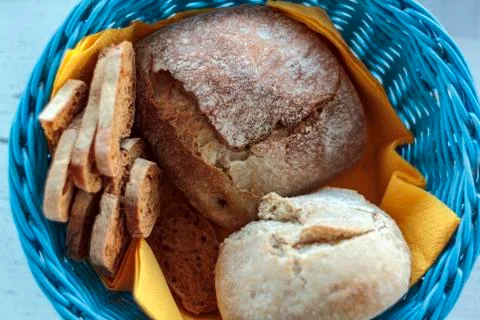 Top view of blue basket with bread and toast Stock Photos