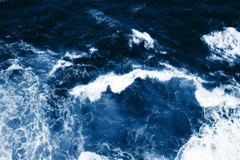 Top view on blue ocean waves. Stock Photos