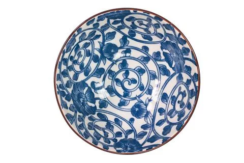 Top view of blue pattern ceramic bowl with black edge. Stock Photos