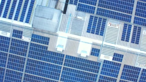 Top view of a blue solar power station on factory rooftop Stock Footage 210789294